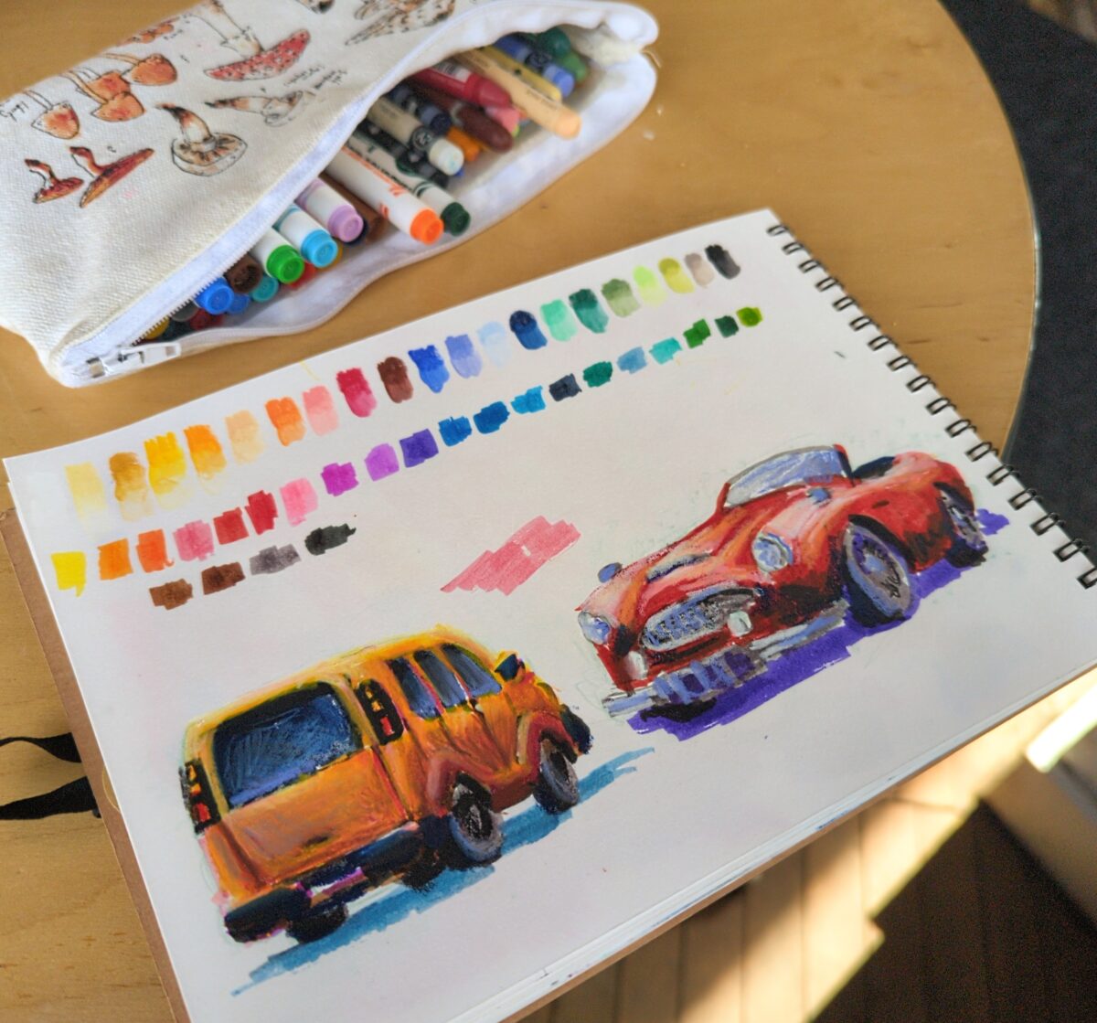 Sketching cars with markers and neocolor iis